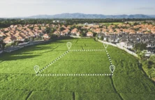 Vente d&rsquo;un terrain : comment réduire l&rsquo;impôt sur votre plus-value ?